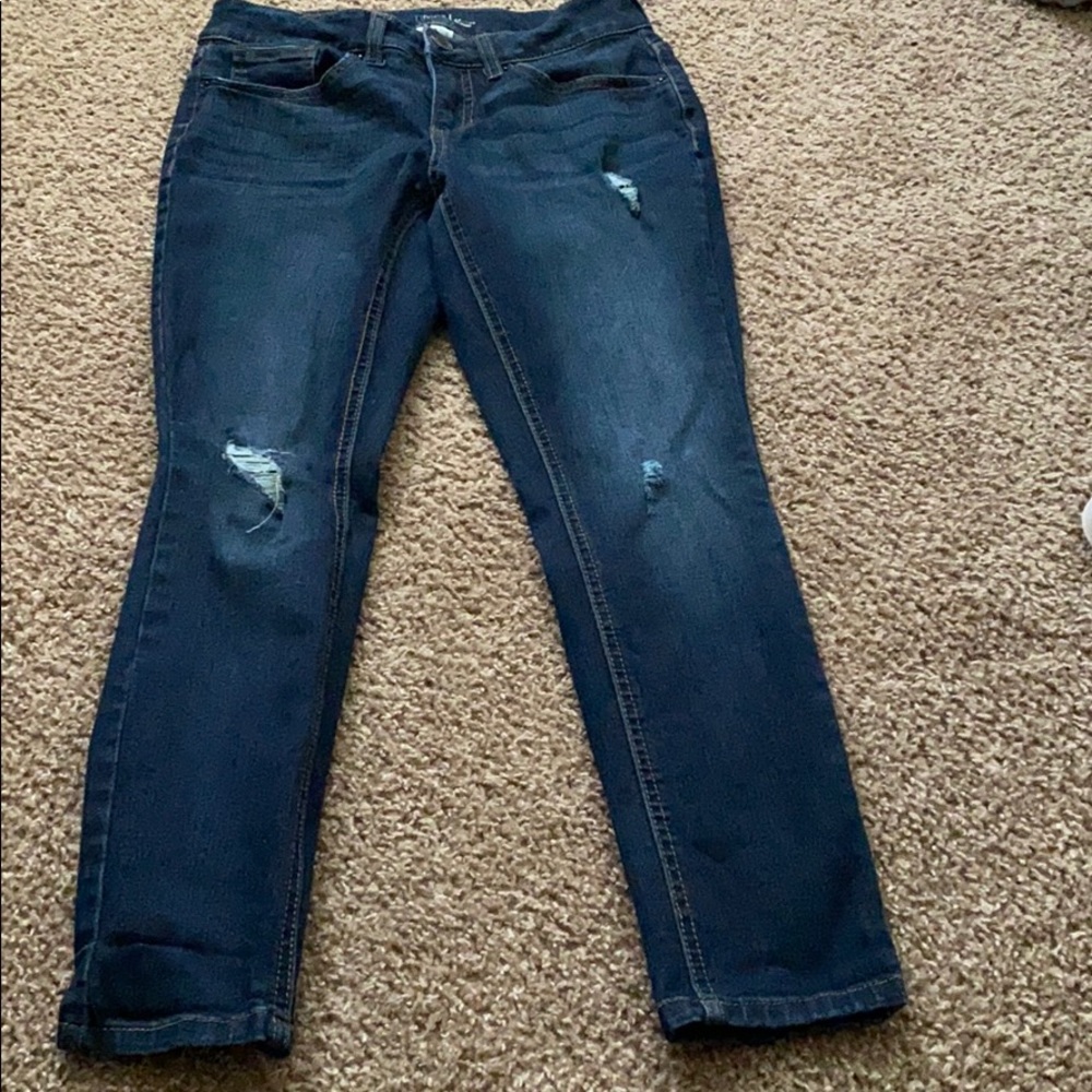 Dark blue Jeans with slight rips